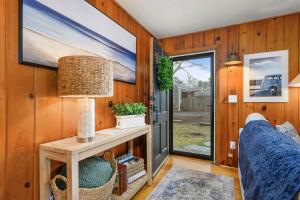 a tiny house with a room with a door at Charming Cape Cottage in Dennis Port in Dennis Port +27 photos