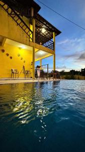 a large pool of water in front of a building at Casa da Duna Moitas-Icaraizinho de Amontada Ceará in Praia de Moitas
