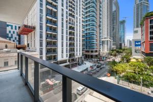 an apartment balcony with a view of a city at 501 First Residences by Palermo Home Miami in Miami