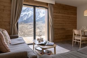 a living room with a view of a mountain at Apartment Leo - 2BR, Modern, Lift access, Mountain views in Les Houches