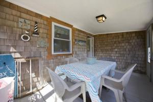a dining room with a table and chairs at 7604 - Uncle Pooh's Cottage in Avon