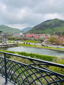 a view of a river from a bridge at Yolyans Hotel in Goris +9 photos