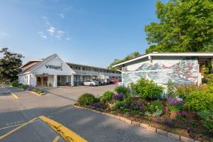 a building with a mural on the side of it at Bar Harbor Villager Motel - Downtown in Bar Harbor