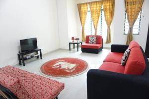 Χώρος καθιστικού στο Warisan Indah Homestay KLIA 1 Melayu sahaja