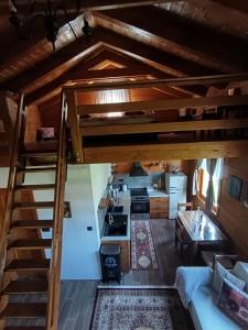 an overhead view of a room with a loft at Lorraine's cabin Plitvice in Drežnik Grad