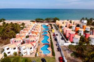 an aerial view of a water park on the beach at Triplex em Maracajaú a beira-mar in Maxaranguape