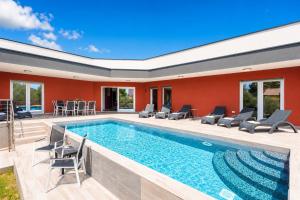 an image of a swimming pool in a house at Villa LM in Krnica