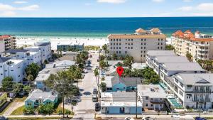 an aerial view of a city with a beach at Coastal Beach Retreat in Clearwater Beach