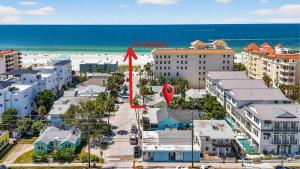 a city with a red arrow pointing to the beach at Coastal Beach Retreat in Clearwater Beach