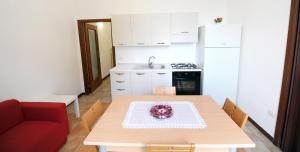 Kuchyň nebo kuchyňský kout v ubytování Casa Vacanze Mamarose