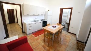 Kuchyň nebo kuchyňský kout v ubytování Casa Vacanze Mamarose