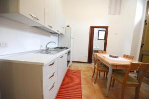 Kuchyň nebo kuchyňský kout v ubytování Casa Vacanze Mamarose