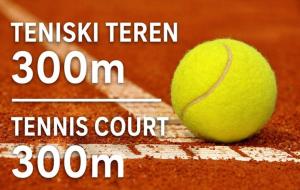 a tennis ball sitting on a tennis court at Long Beach Truma in Ulcinj