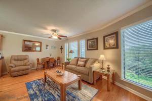 a living room with a couch and a table at CL 2459 Yellow Rose in Canyon Lake +17 photos