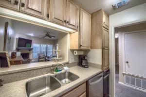 a kitchen with a sink and a counter top at CW B206 Rivers Edge in New Braunfels +20 photos