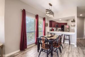 a kitchen and dining room with a table and chairs at IC 309 Wine Dine in New Braunfels