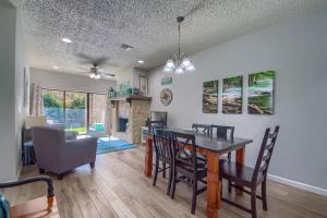 a dining room and living room with a table and chairs at CW C107 Spritzen Haus in New Braunfels