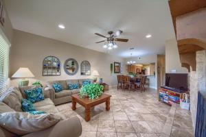 a living room with a couch and a table at CW C207 River Zen in New Braunfels