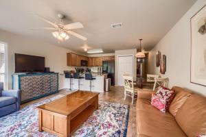a living room with a couch and a table at WW H303 Dreams and Streams in New Braunfels +24 photos
