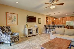 a living room with a couch and a table at RG 208 Rivendell On The Guadalupe in Canyon Lake
