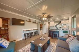a living room with a couch and a table at RRC A302 River Hippie in New Braunfels