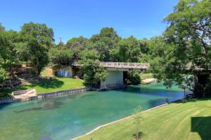 an overhead view of a river with a bridge at IC 112 Cowboy Corral in New Braunfels
