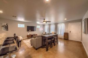 a living room with a couch and a table at RR 464 Sattler Haus in Canyon Lake +20 photos