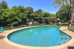 a small swimming pool with a fence around it at IC 316 Riverfront Bliss in New Braunfels +32 photos