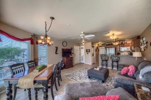 a living room with a couch and a table at WW D302 Chateau Relaxeau in New Braunfels