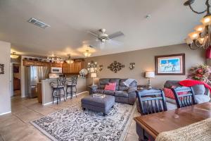 a living room with a couch and a table at WW D302 Chateau Relaxeau in New Braunfels