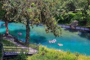 an aerial view of people rafting in a river at CW B202 Camp Boogie Bahn B202 in New Braunfels