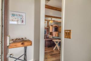 a door leading into a kitchen with a living room at RR 1300 Hondos River Haus in Canyon Lake