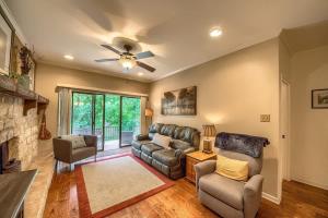 a living room with a couch and a fireplace at CW C113 Comal Vista in New Braunfels