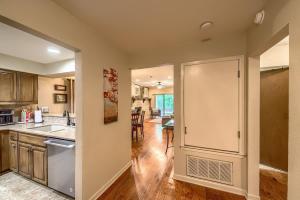 a kitchen with a refrigerator and a dining room at CW C113 Comal Vista in New Braunfels +31 photos