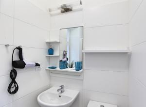 Koupelna v ubytování Angel City Aparthotel