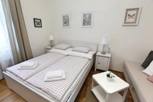 Postel nebo postele na pokoji v ubytování Angel City Aparthotel