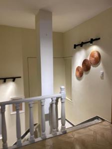 two donuts hanging on a wall in a hallway at Estudio 201 Barrio blanco Estrato 5 in Cúcuta