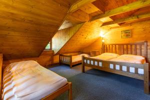 Llit o llits en una habitació de Sruby Haida