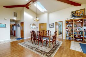 a dining room with a table and chairs at Pinnacle Heights in Bodega Bay