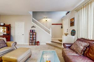 a living room with a couch and a table at The Grape Escape in Santa Rosa