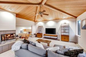 a living room with a couch and a fireplace at Latitude 38 in Bodega Bay