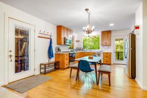 a kitchen with a table and chairs in it at Caz Cabin 6 in Cazadero