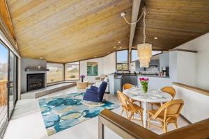 a kitchen and dining room with a table and chairs at Mar Vista in Bodega Bay