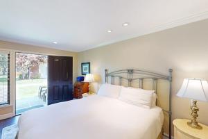 a bedroom with a large bed and a window at Silverado Resort and Spa 381 & 382 in Napa