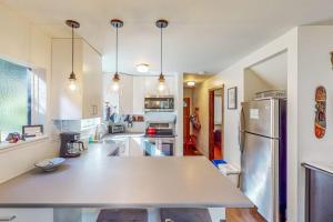 a large kitchen with a large white counter top at Cazadero Dreams in Cazadero