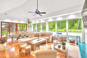 a living room filled with furniture and a ceiling fan at Zegarra Estate in Sebastopol