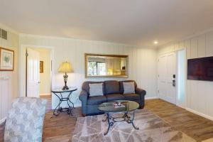 a living room with a couch and a table at Silverado Resort and Spa 353 in Napa