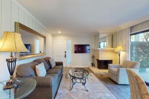 a living room with a couch and a table at Silverado Resort and Spa 353 in Napa +30 photos
