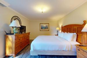 a bedroom with a large bed and a television at Silverado Resort and Spa 353 in Napa