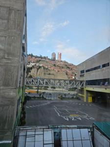 an empty parking lot next to a building at Zona Sur, Bajo Seguencoma Flat in La Paz